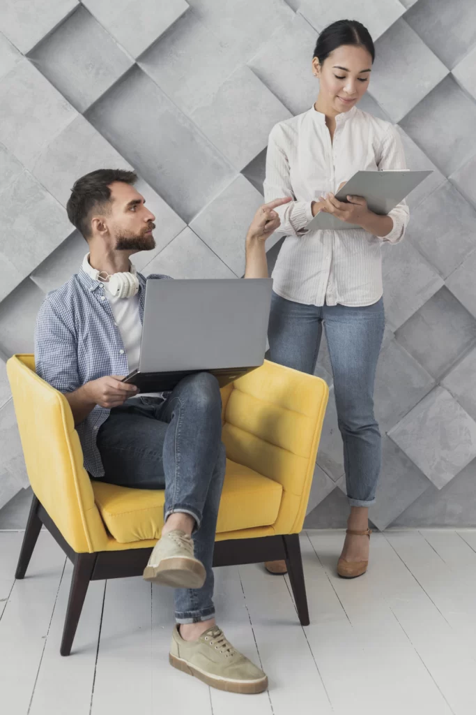 Display Ads 4 high angle male chair talking with colleague 1