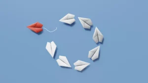 Paper planes soaring in unique formations, symbolizing the concept of individuality